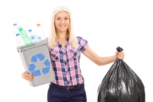 Professional waste clearance team handling construction debris